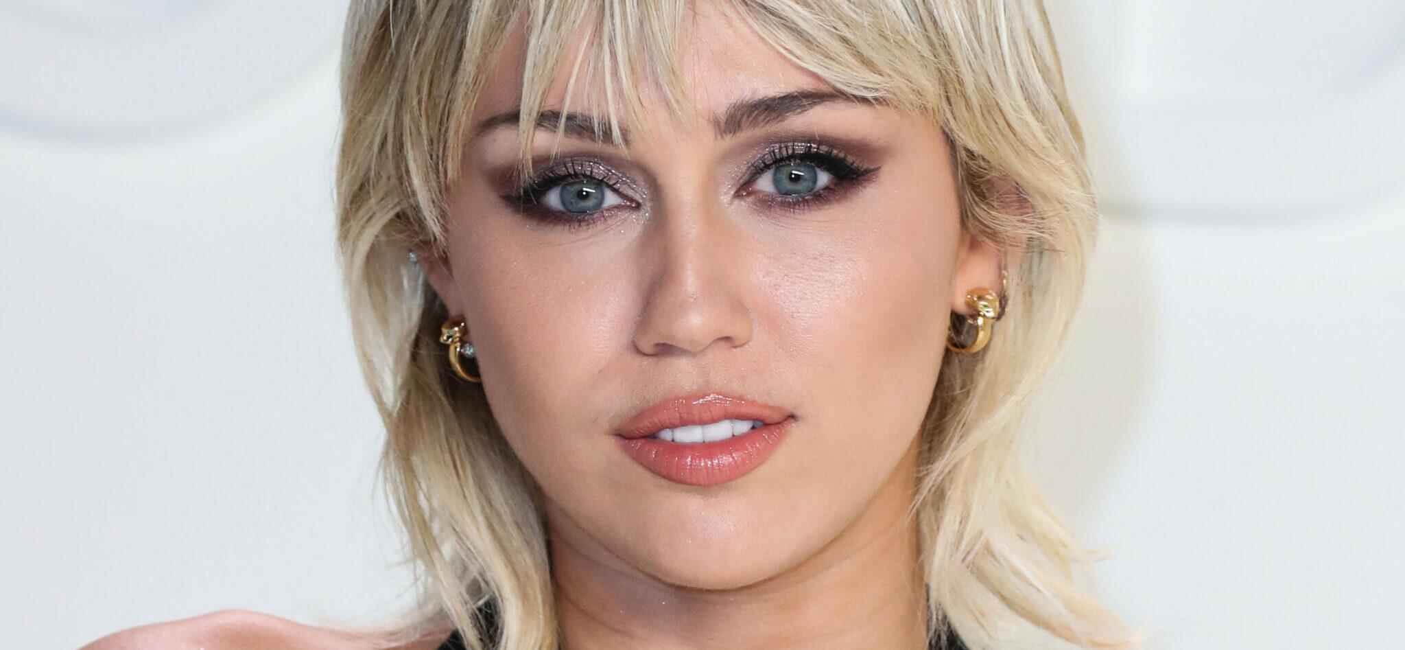 Miley Cyrus Dons Latex Cone Bra In Flirty Promo For Her New Single