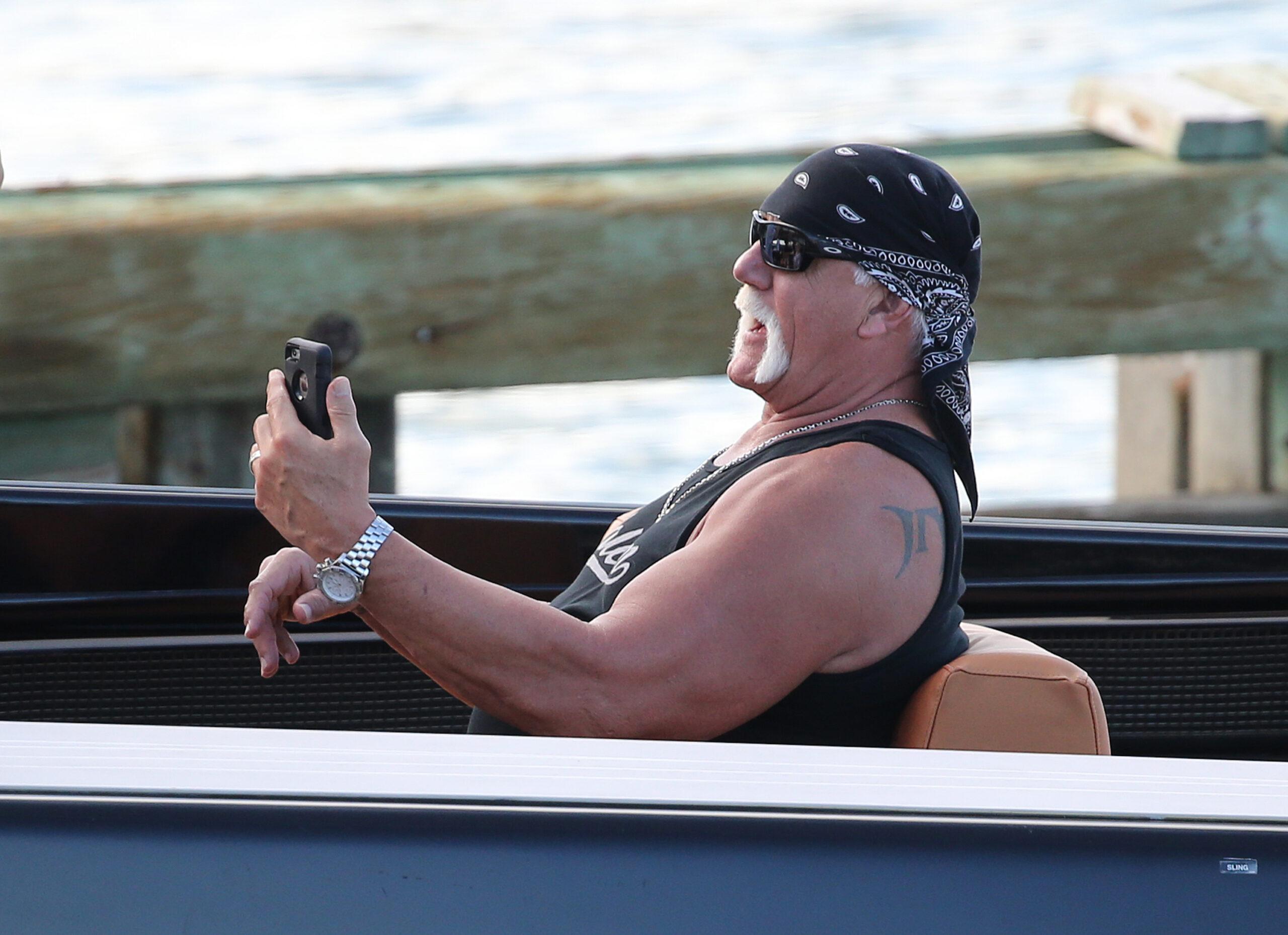 Former Wrestler Hulk Hogan takes a ride on Dave Grumman apos s boat in Miami