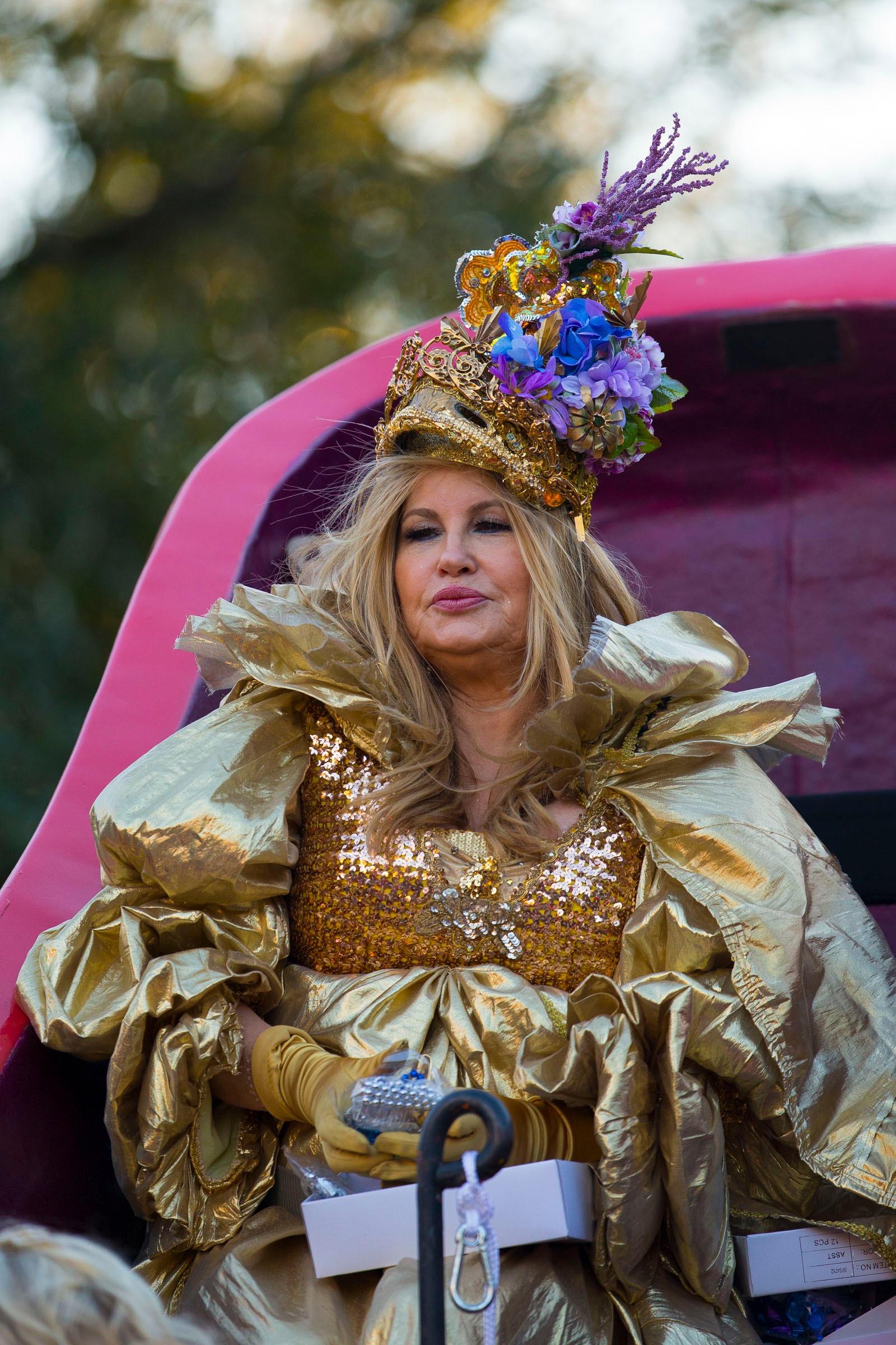 American Pie actress Jennifer Coolidge 58 rides in the giant shoe of apos Muses apos as part of the quot Krewe of Muses quot an all female parade during Mardi Gras