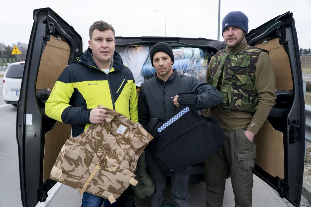 Ukrainian Conflict British citizen Anton Vybornyi pictured at the border to Ukraine Korczowa Poland with his van loaded full with military equipment It includes body armour Anton left pictured with his team Alexei Kalmikov and Andrius Dargis 4th M