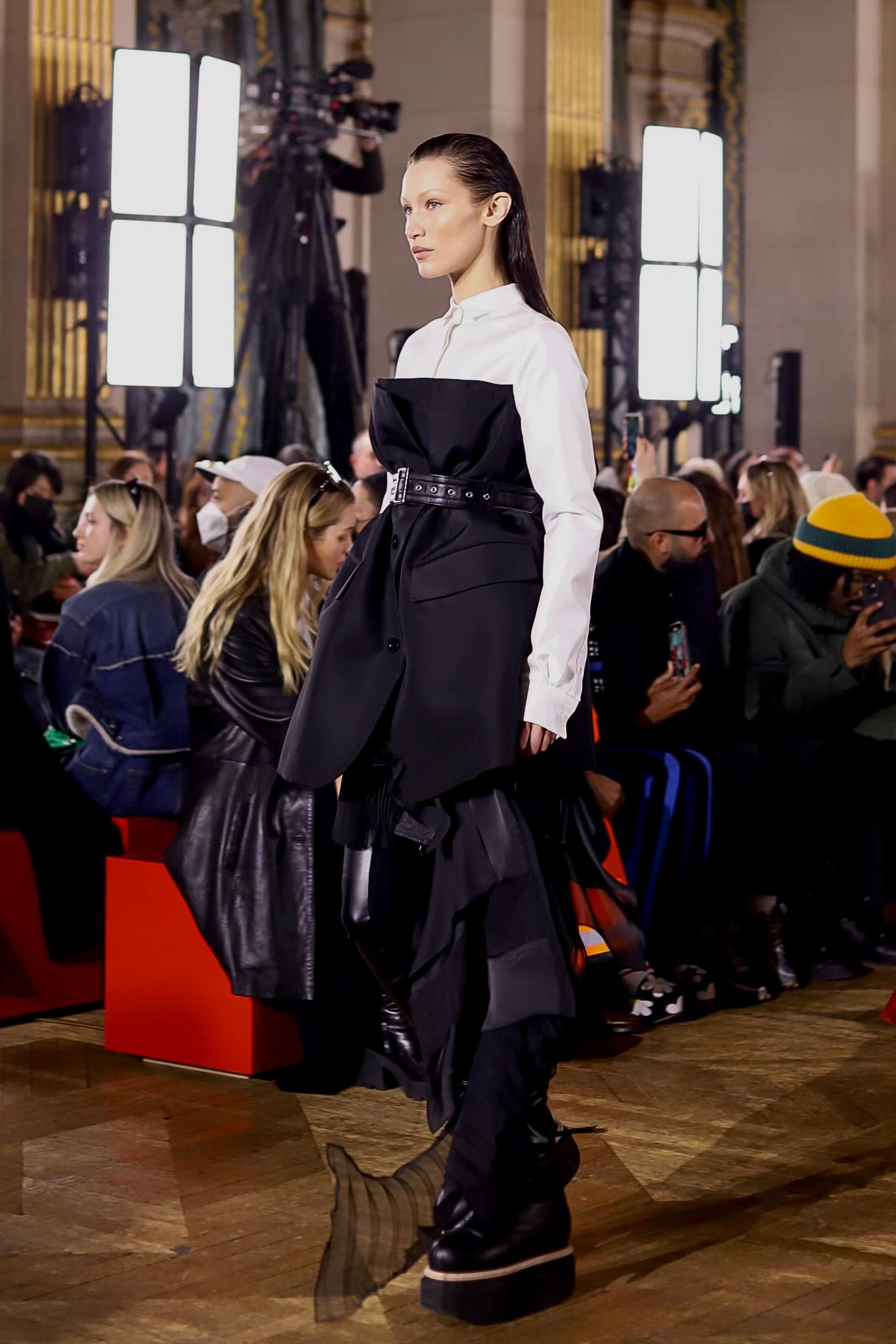 Bella Hadid walks the runway during the Sacai fashion show in Paris
