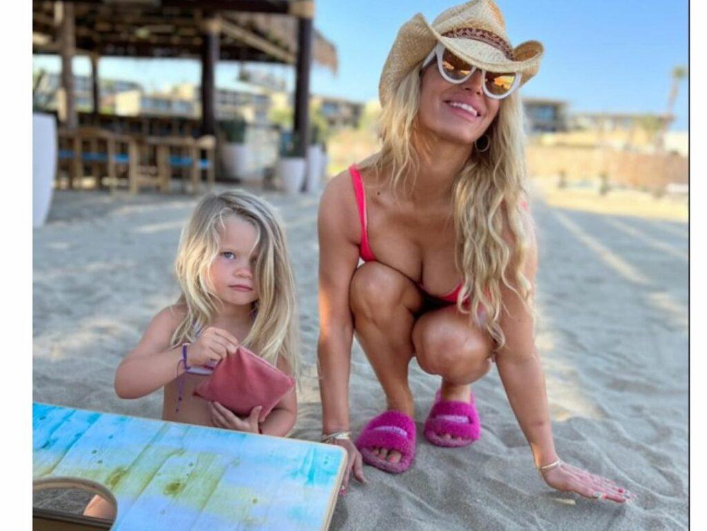 Jessica Simpson and her daughter posing for the camera.