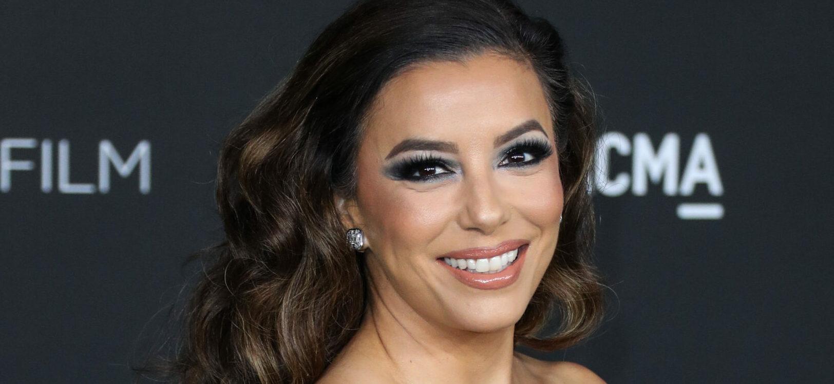 Eva Longoria Shows Skin In A Ridiculously HighCut White Swimsuit
