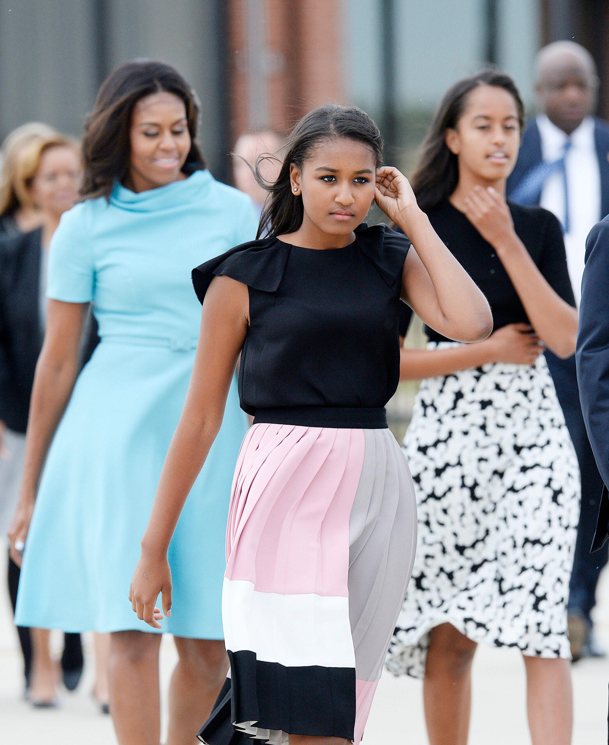 Former First Lady Michelle Obama with daughters Sasha and Malia arrive to welcome His Holiness Pope Francis