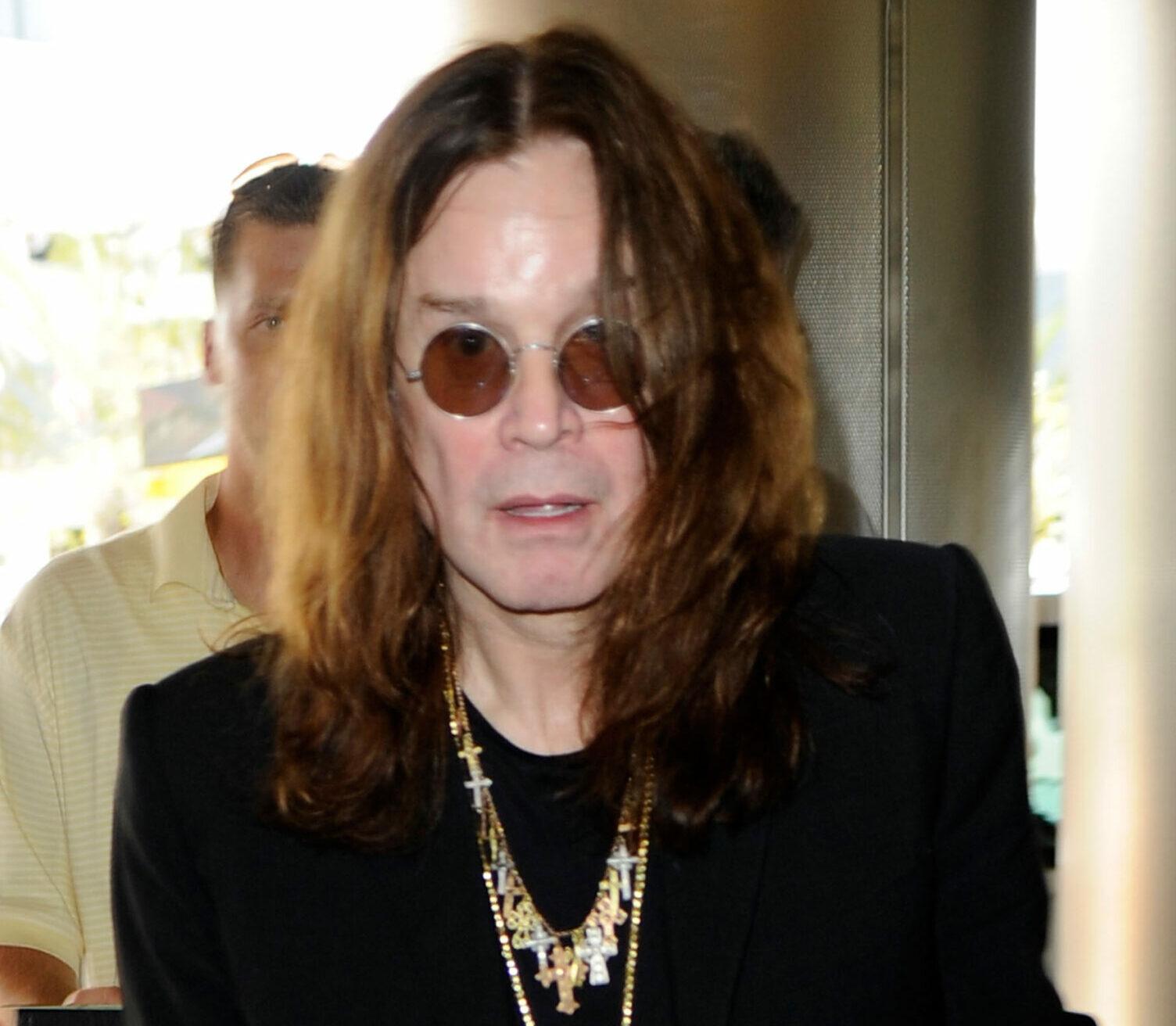 Ozzy Osbourne and wife Sharon Osbourne and daughter Kelly Osbourne arrive at Miami International Airport