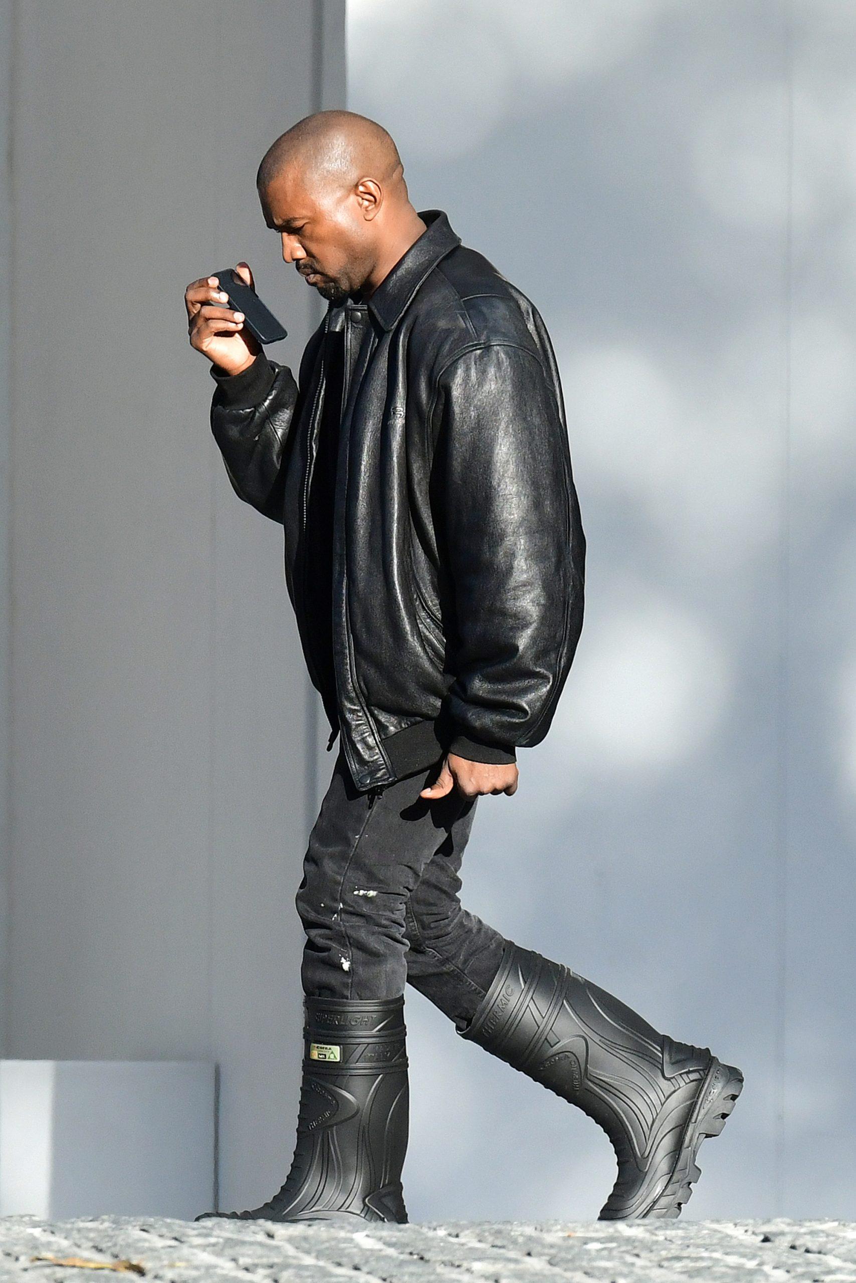 Kanye West is back in his boots as he makes his way around Miami