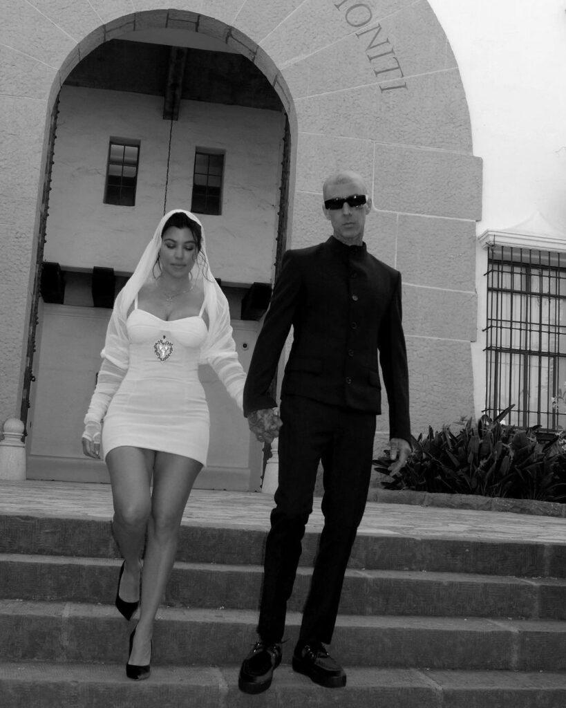 Kourtney Kardashian and Travis Barker share wedding pictures