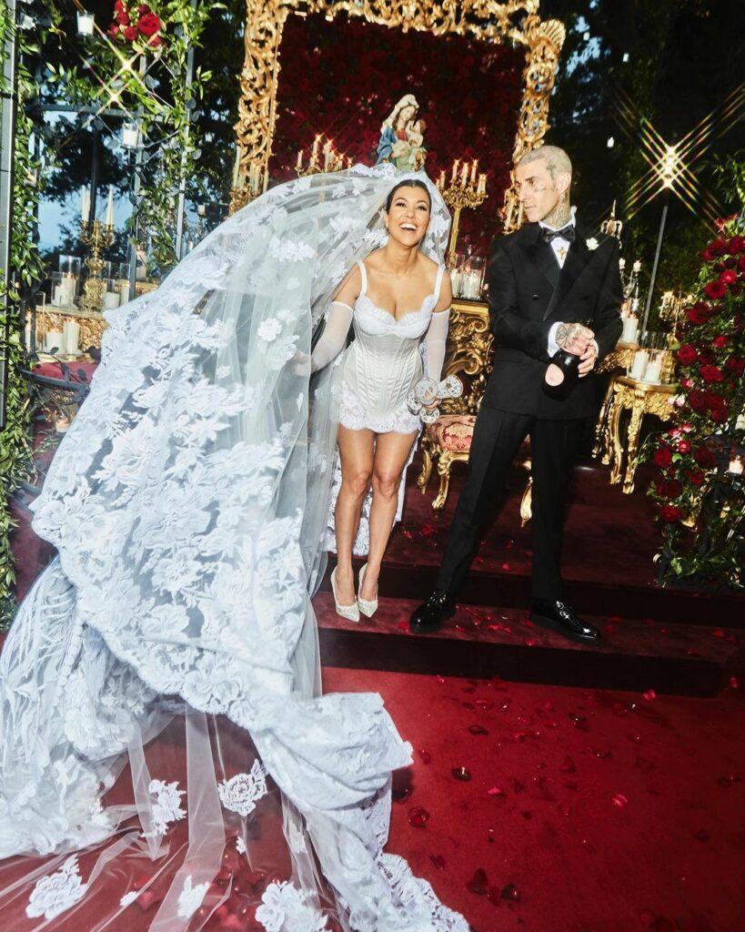 Kourtney Kardashian and Travis Barker share wedding pictures