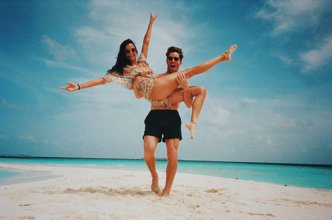 Shaun White carrying Nina Dobrev.