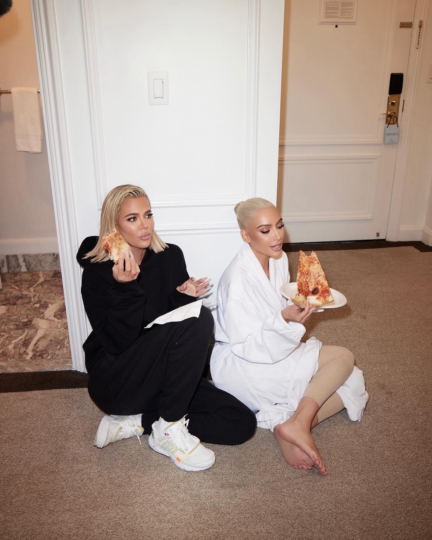 Kim and eating pizza