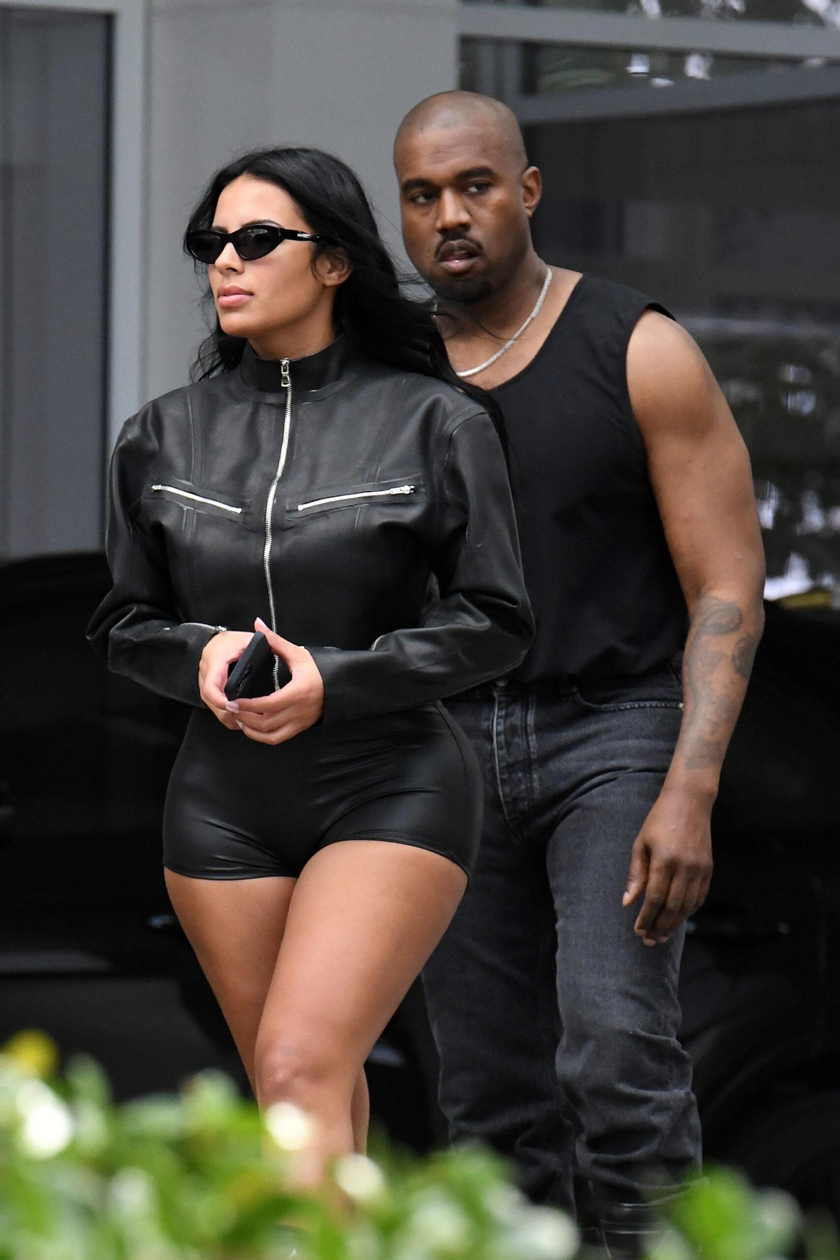 A newly single Kanye West is seen leaving his hotel with new girlfriend Chaney Jones in Miami. 03 Mar 2022 Pictured: Kanye West; Chaney Jones; Ye. Photo credit: MEGA TheMegaAgency.com +1 888 505 6342 (Mega Agency TagID: MEGA833951_001.jpg) [Photo via Mega Agency]