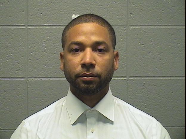 Jussie Smollett looks stony-faced in a new mugshot photograph.