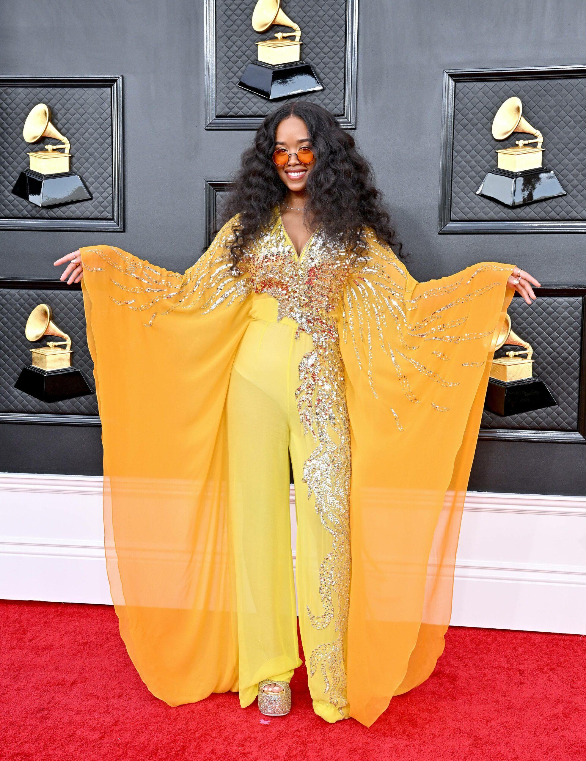 64th Annual GRAMMY Awards. MGM Grand Garden Arena, Las Vegas, Nevada. Pictured: Tiffany Haddish. EVENT April 3, 2022. 03 Apr 2022 Pictured: H.E.R. Photo credit: AXELLE/BAUER-GRIFFIN / MEGA TheMegaAgency.com +1 888 505 6342 (Mega Agency TagID: MEGA844590_081.jpg) [Photo via Mega Agency]