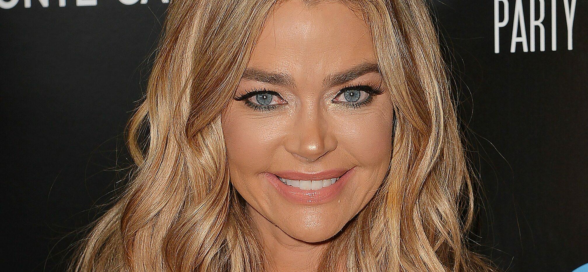 Denise Richards Hits The Beach In Cannes In A High-Slit Dress