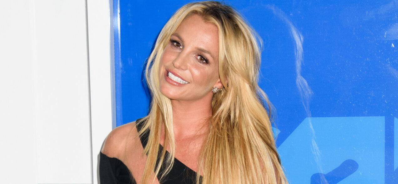 Britney Spears Suffers A Nip Slip In White Floral Dress