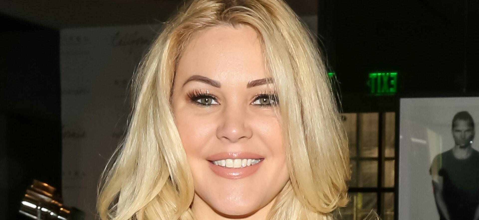Shanna Moakler Puts Her Curves On Display In Plunging Skin-Tight Jump Short