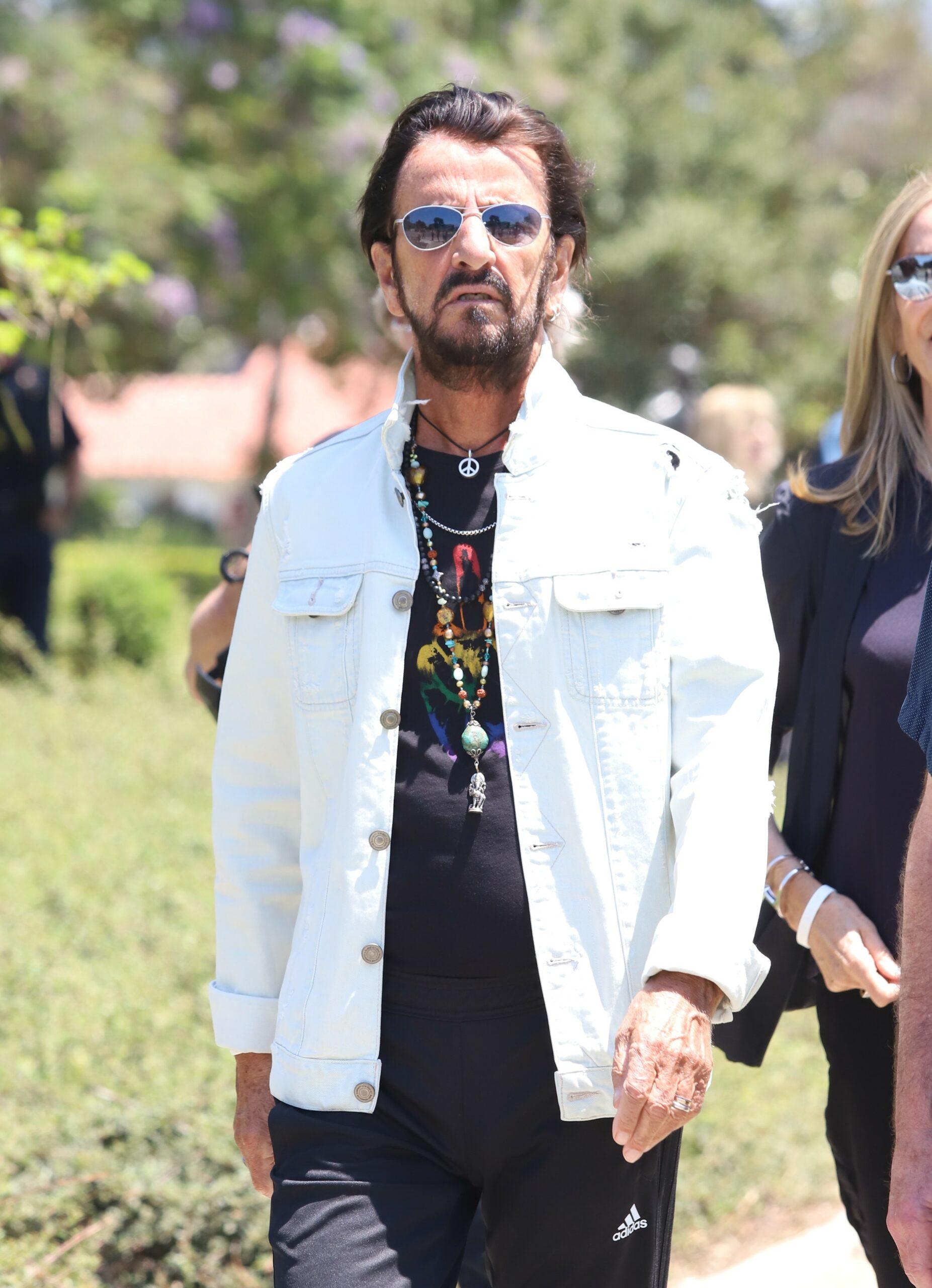 Ringo Starr celebrates his 81st birthday with a gathering and appears for his "Peace and Love" artwork to celebrate