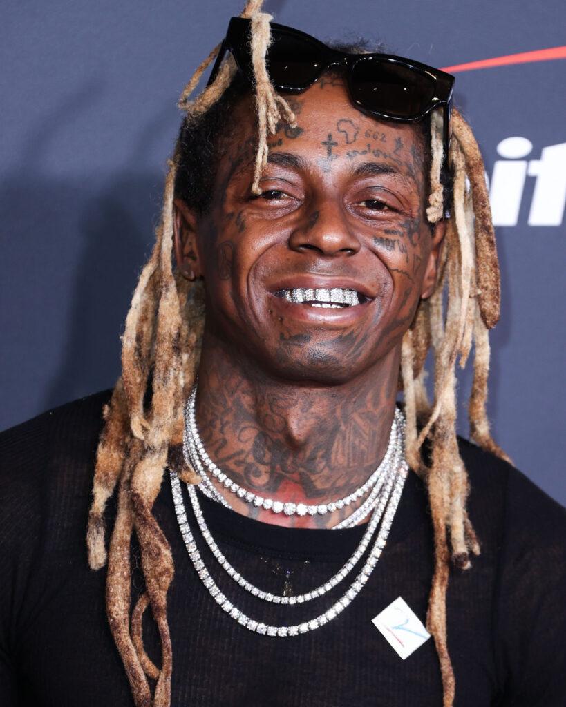 Lil' Wayne Sued For Punching Former Assistant On Private Jet