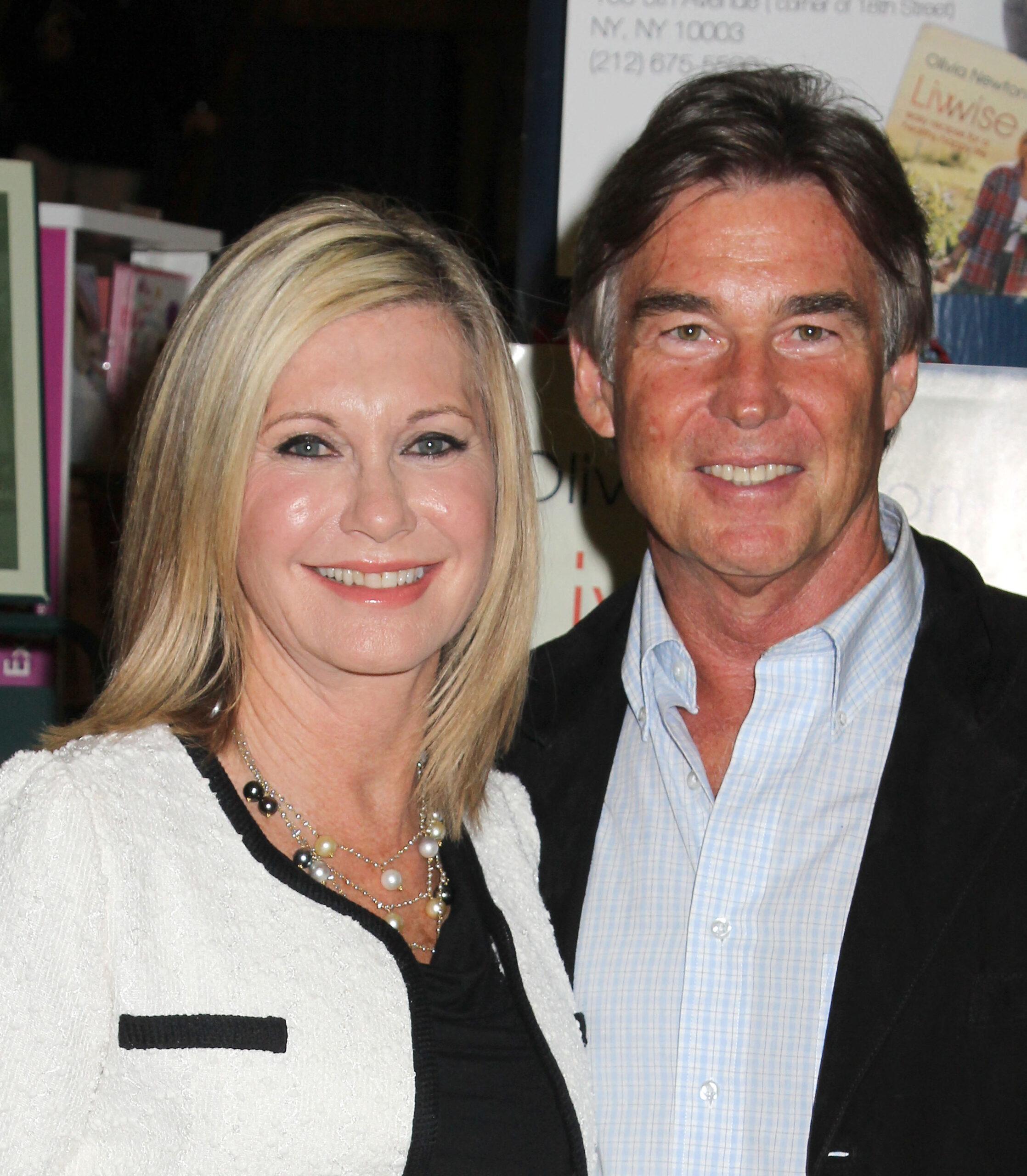 Olivia Newton-John and husband John Easterling at American Country Awards 2013