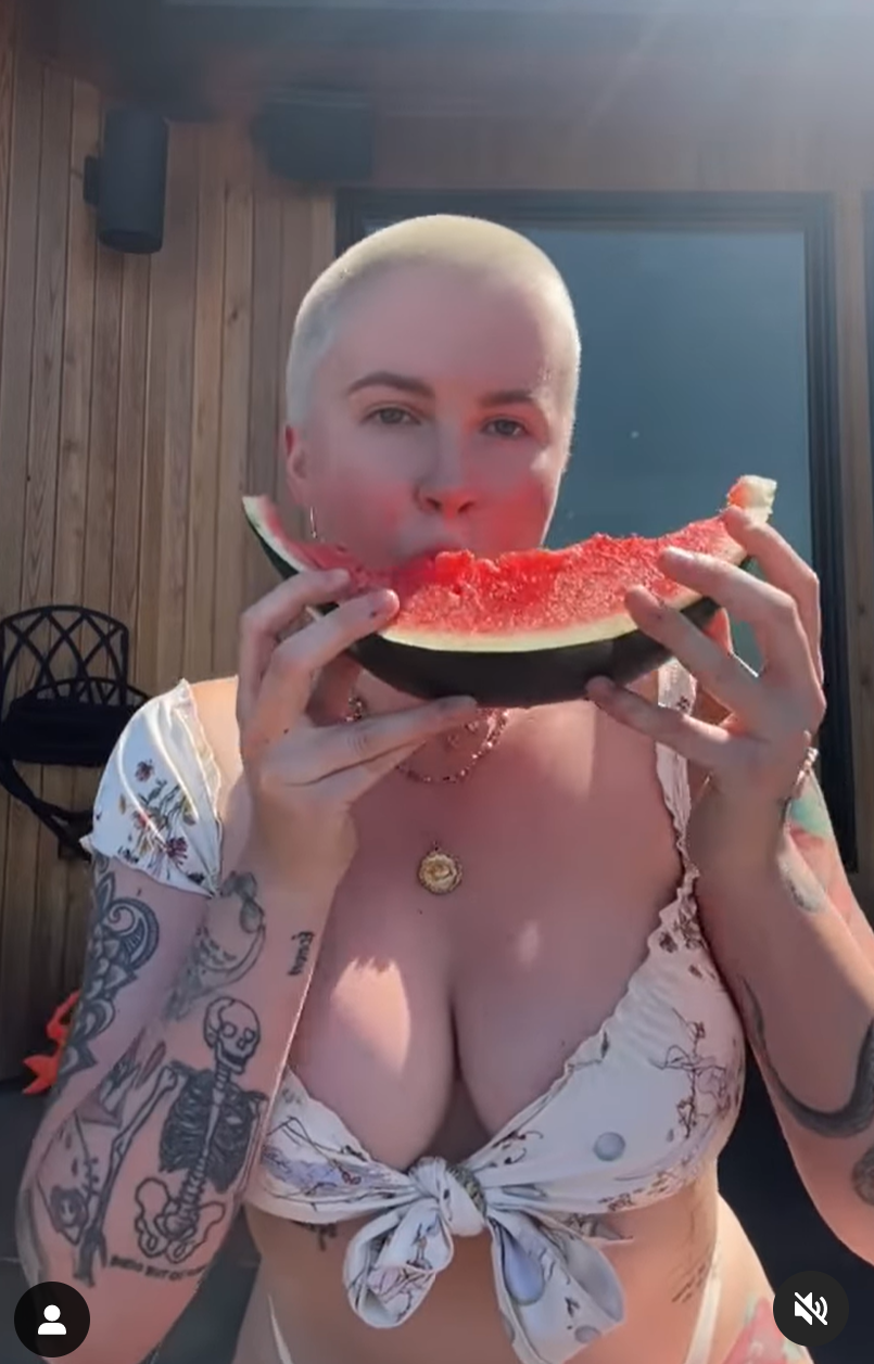 Ireland Baldwin eats watermelon