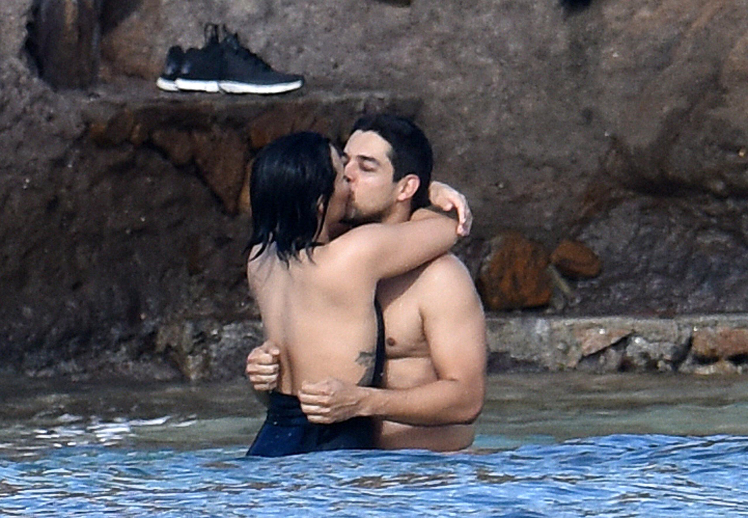 Singer Demi Lovato wears a black one piece swimsuit while she and boyfriend Wilmer Valderrama show PDA while swimming in the ocean in St Bart apos s