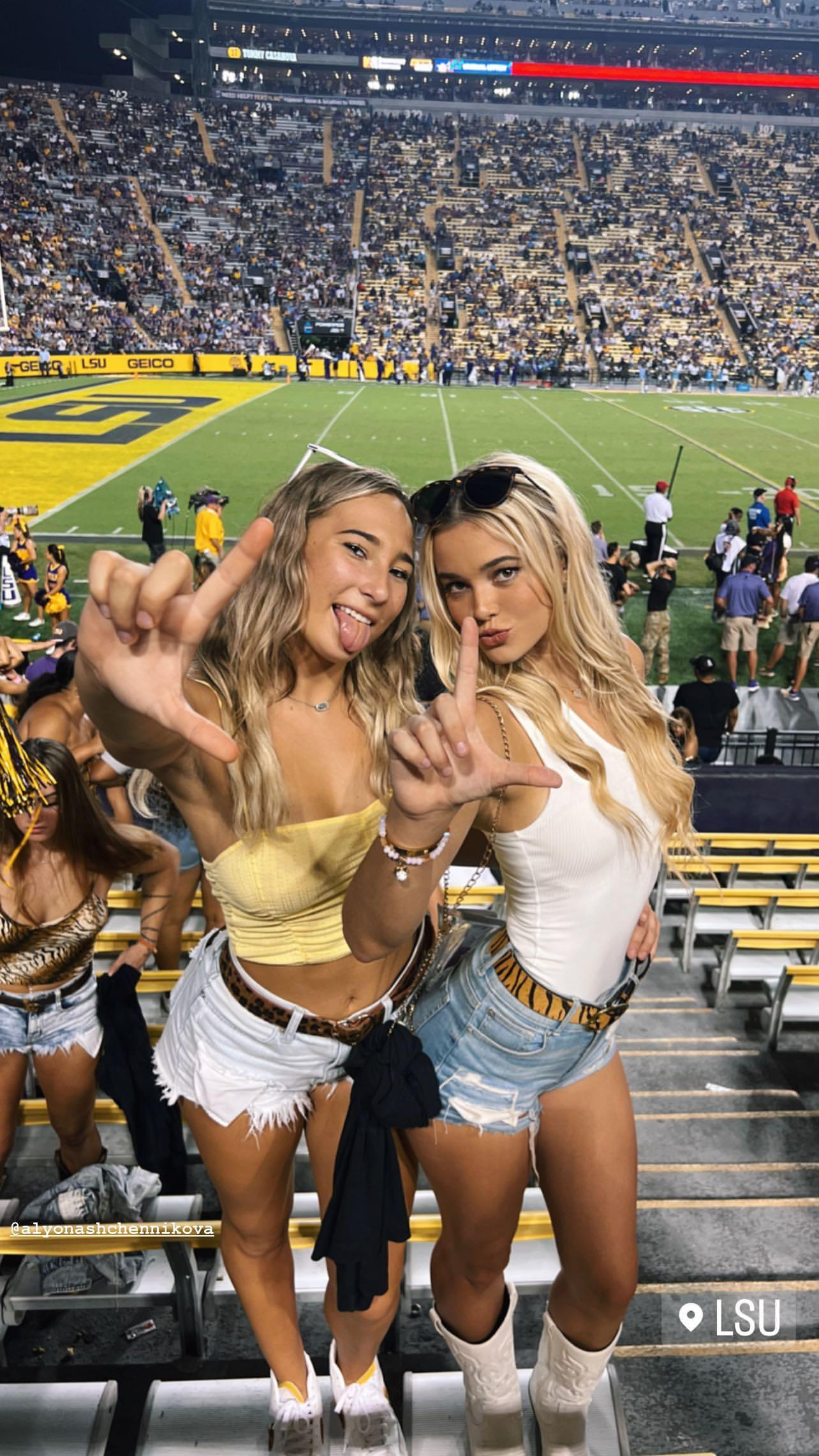 Olivia Dunne posing for the camera with a friend.