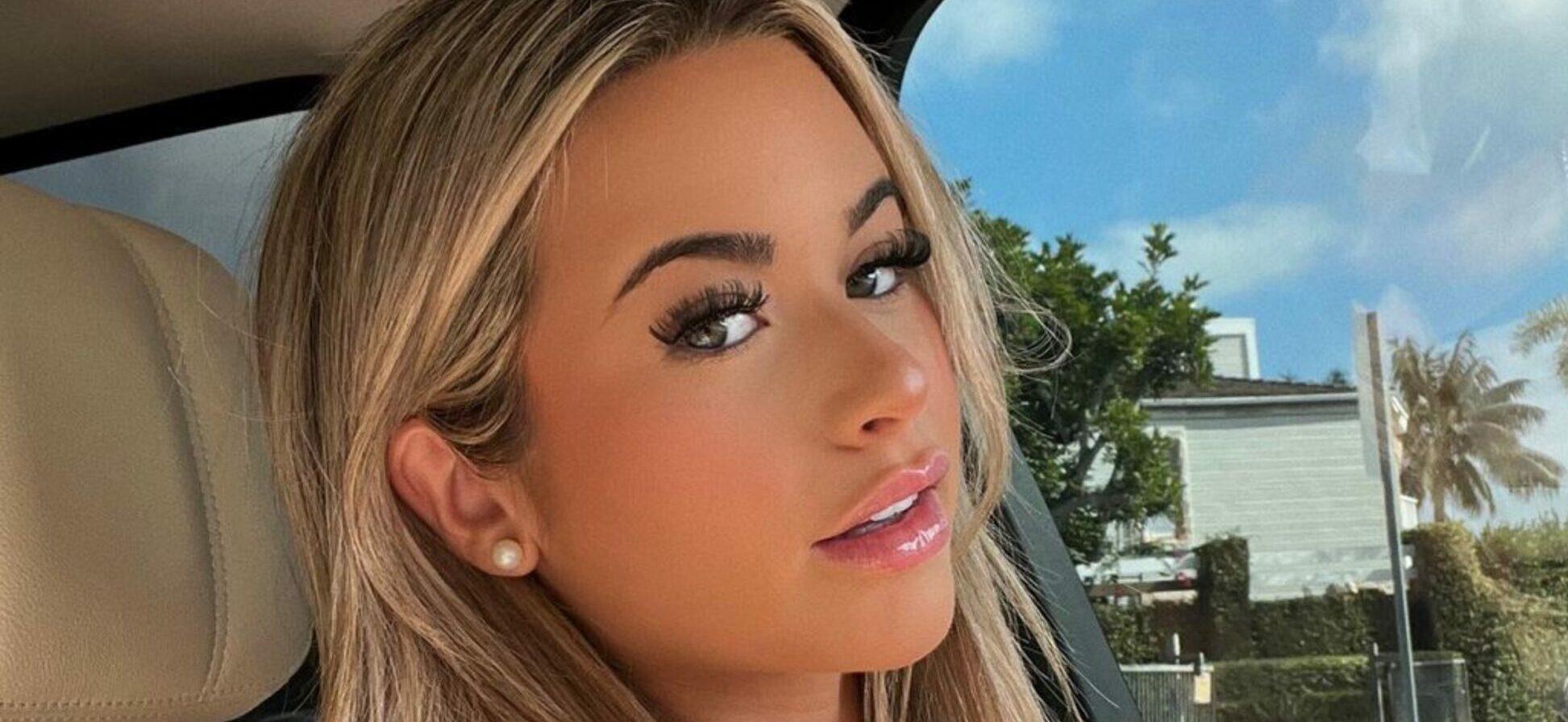 Emily Elizabeth Lets Her Massive Chest Hang In Tiny Bandeau Bikini