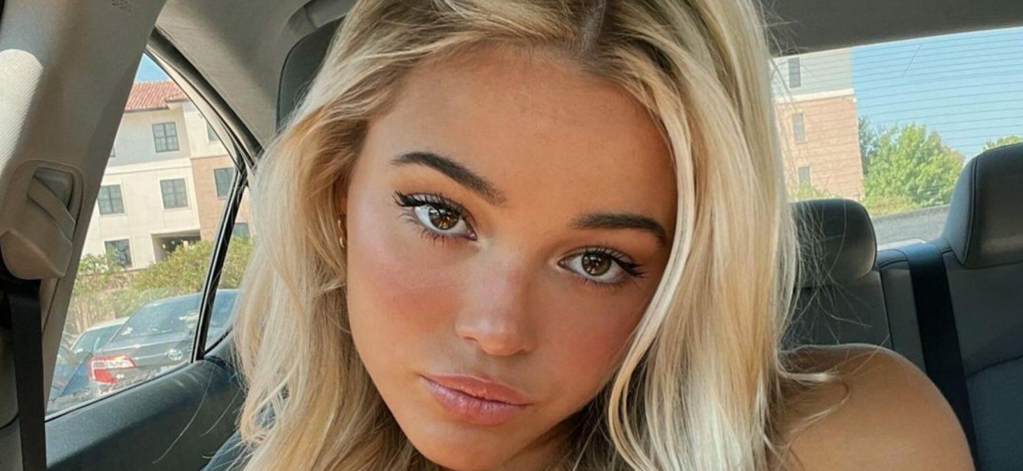 LSU Gymnast Olivia Dunne Takes A Selfie In Her Plunging Black Top!