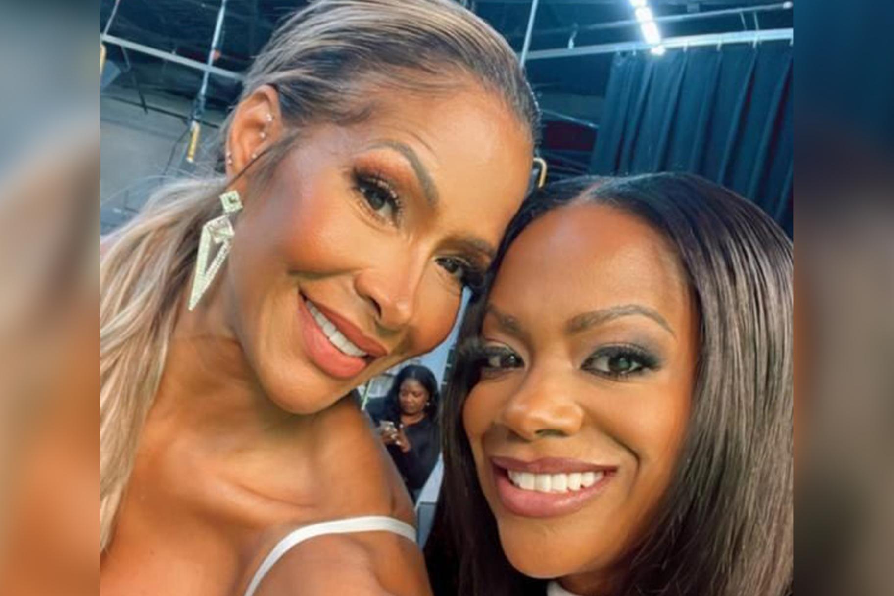 Sheree Whitfiled and Kandi Burruss taking a selfie