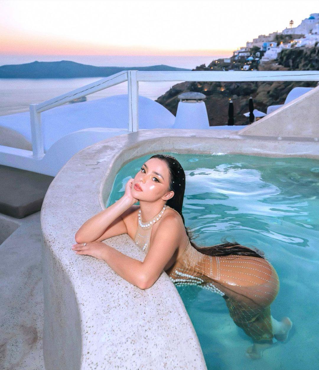 Demi Rose poses for the camera.