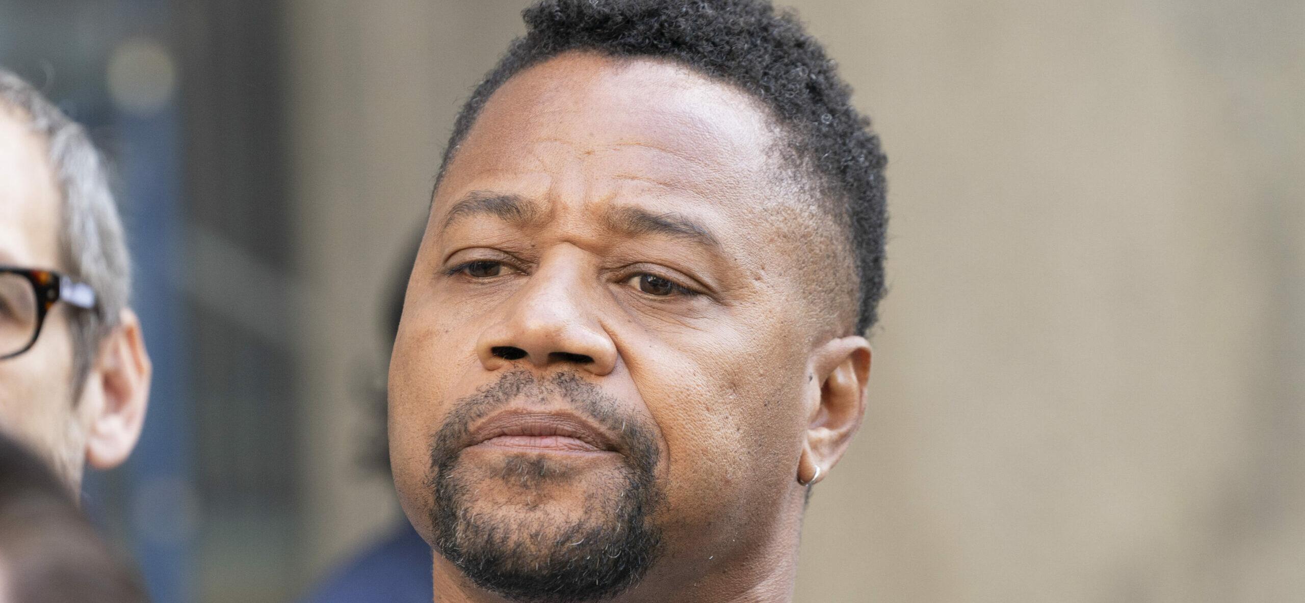 October 15, 2019, New York, United States: Actor Cuba Gooding Jr. listens as attorney Mark Heller addresses press after arraignment in Manhattan's New York State Supreme Court. 15 Oct 2019