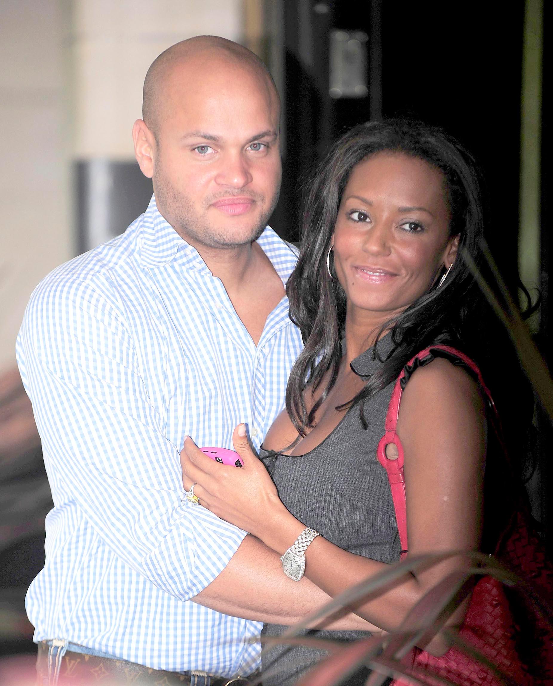 MEL B AND HUSBAND STEPHEN BELAFONTE LEAVING A HOTEL IN LONDON.