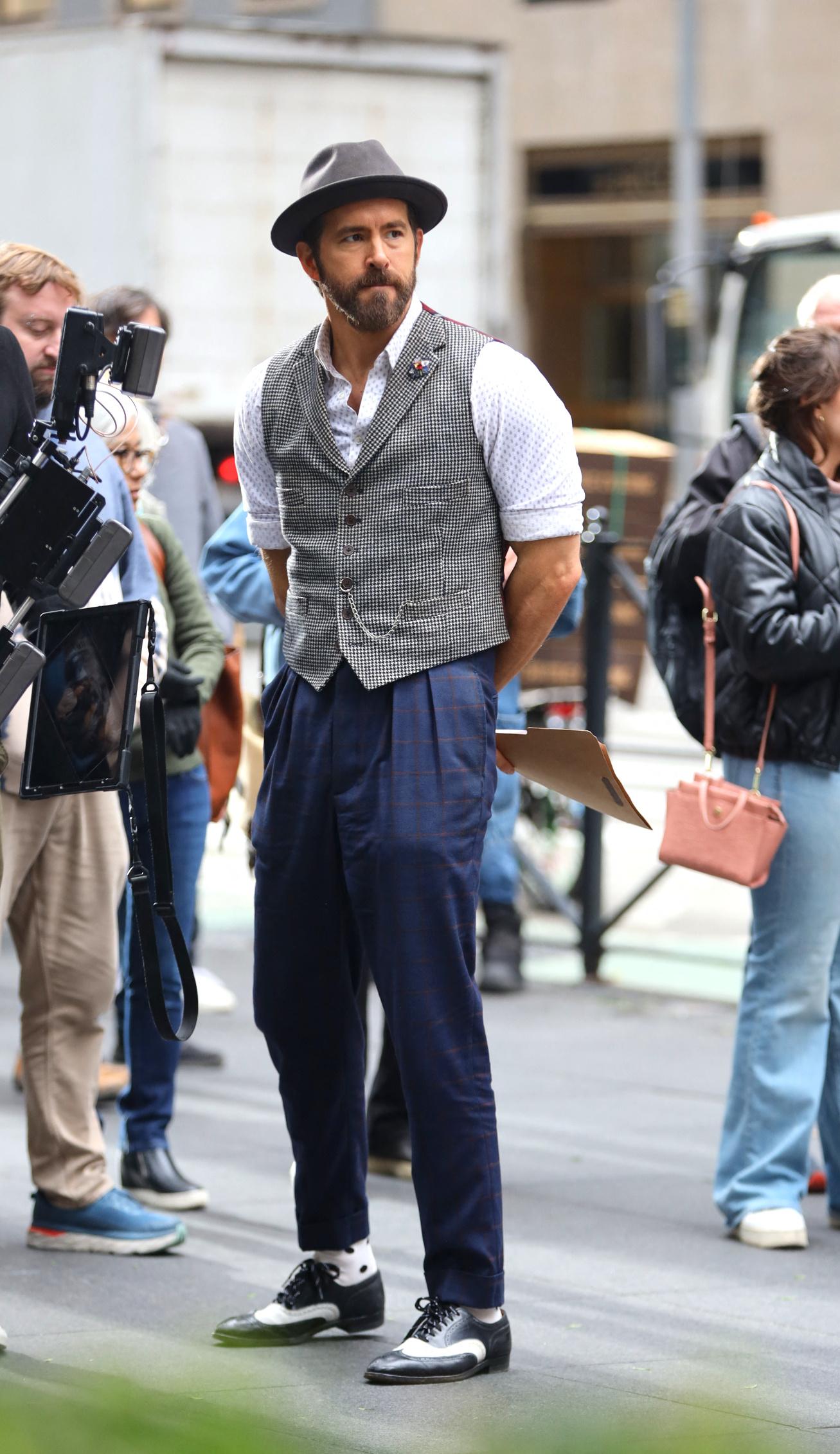 Ryan Reynolds and Cailey Flemmingvseen filming scenes in front of Radio City Music Hall for their new movie Imaganiary Friends directed by John Krasinski