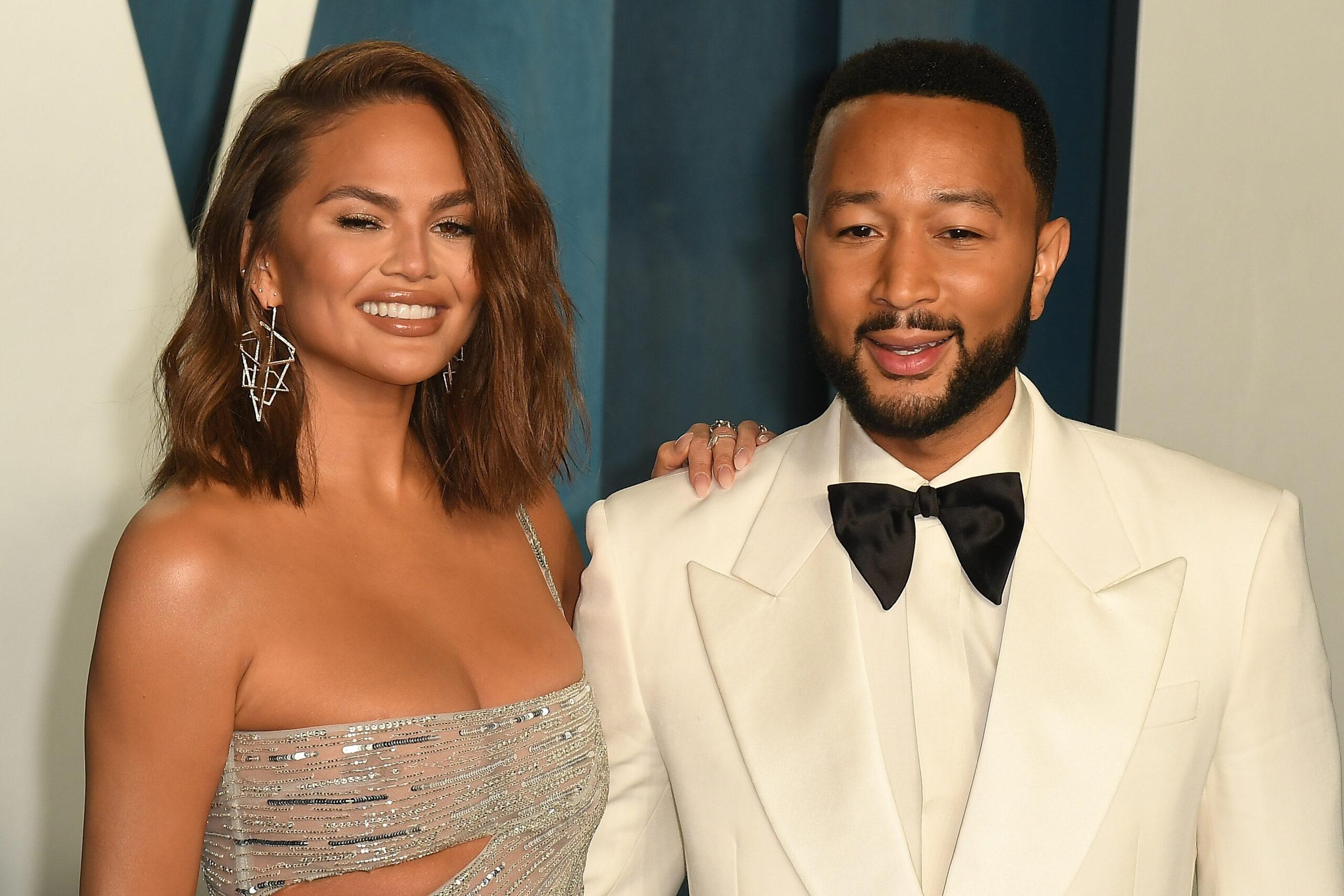 Chrissy Teigen Wore a Sheer Lacy Top for a Date Night at a Drake