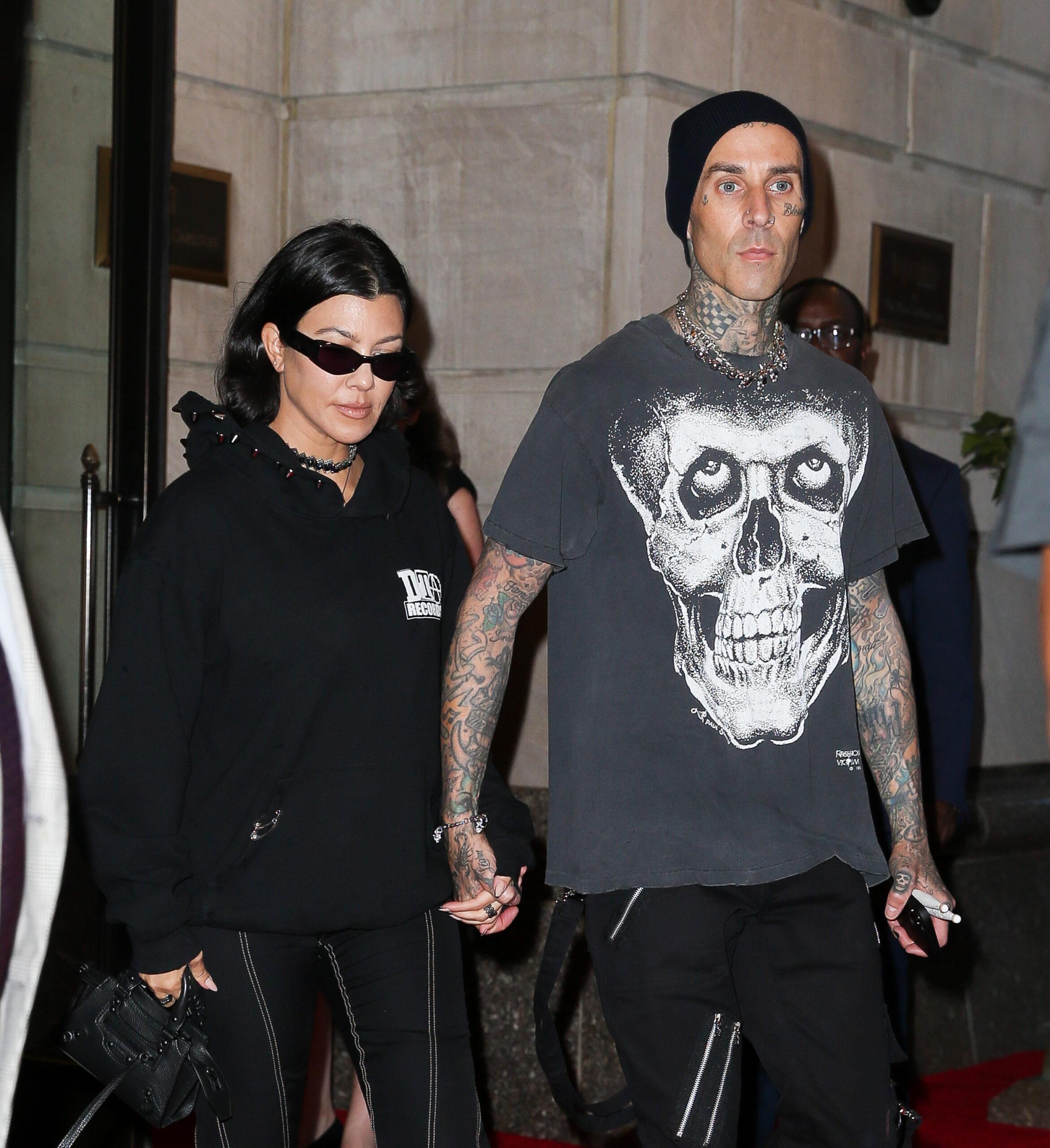 Kourtney Kardashian and Travis Barker seen hand-in-hand as leaving their hotel in NYC