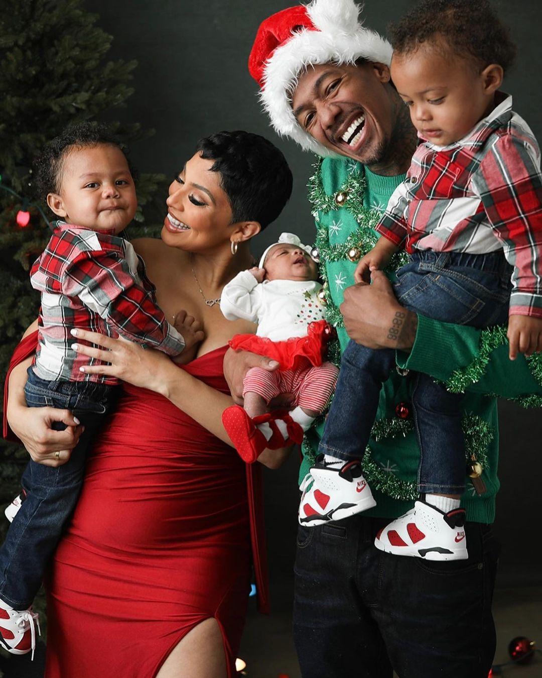 Nick Cannon and Abby De La Rosa with kids for Christmas photo