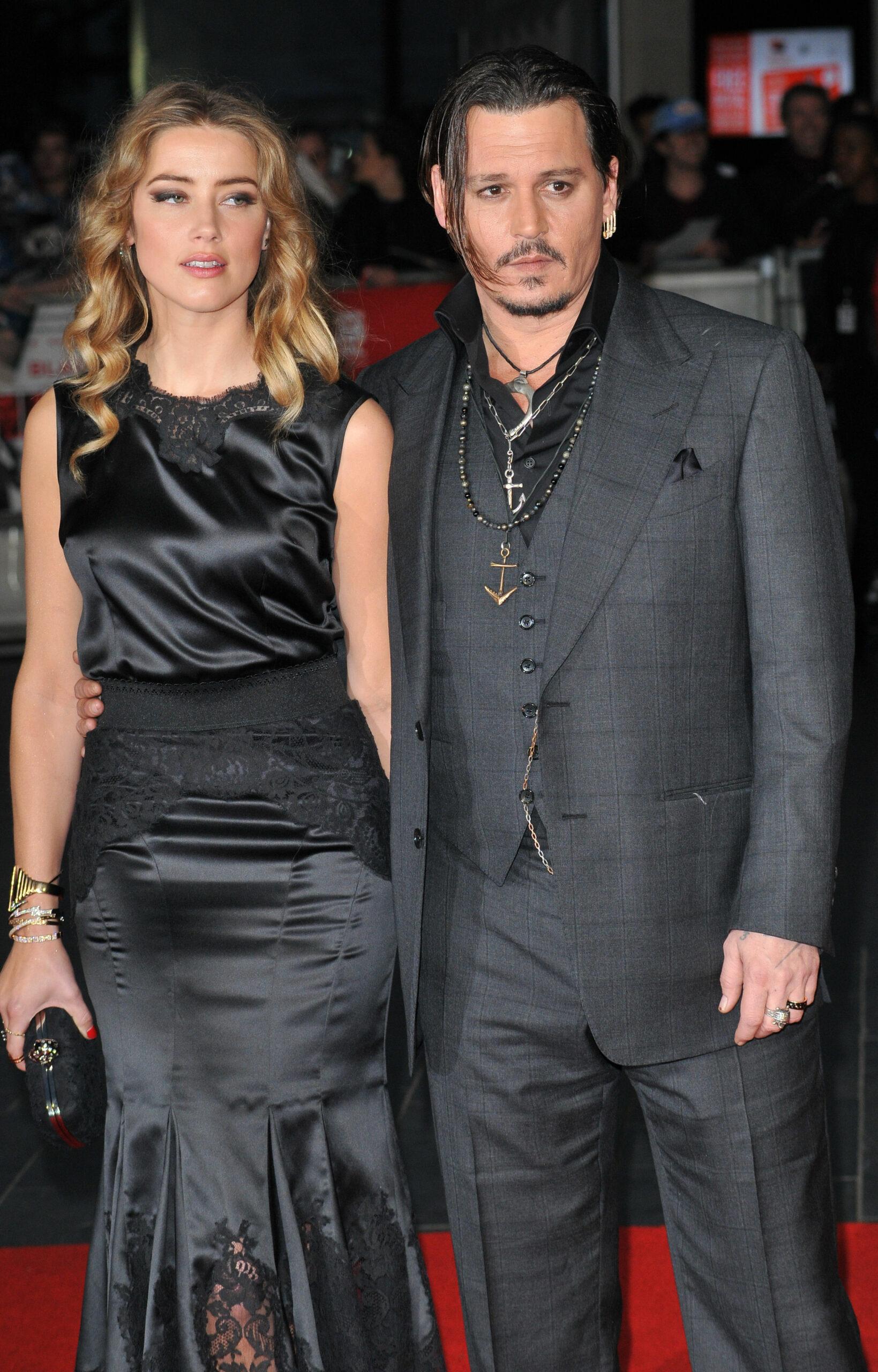 Amber Heard and Johnny Depp attend 'The Danish Girl' premiere during the 2015 Toronto International Film Festival held at the Princess of Wales Theatre on September 12, 2015 in Toronto, Canada.