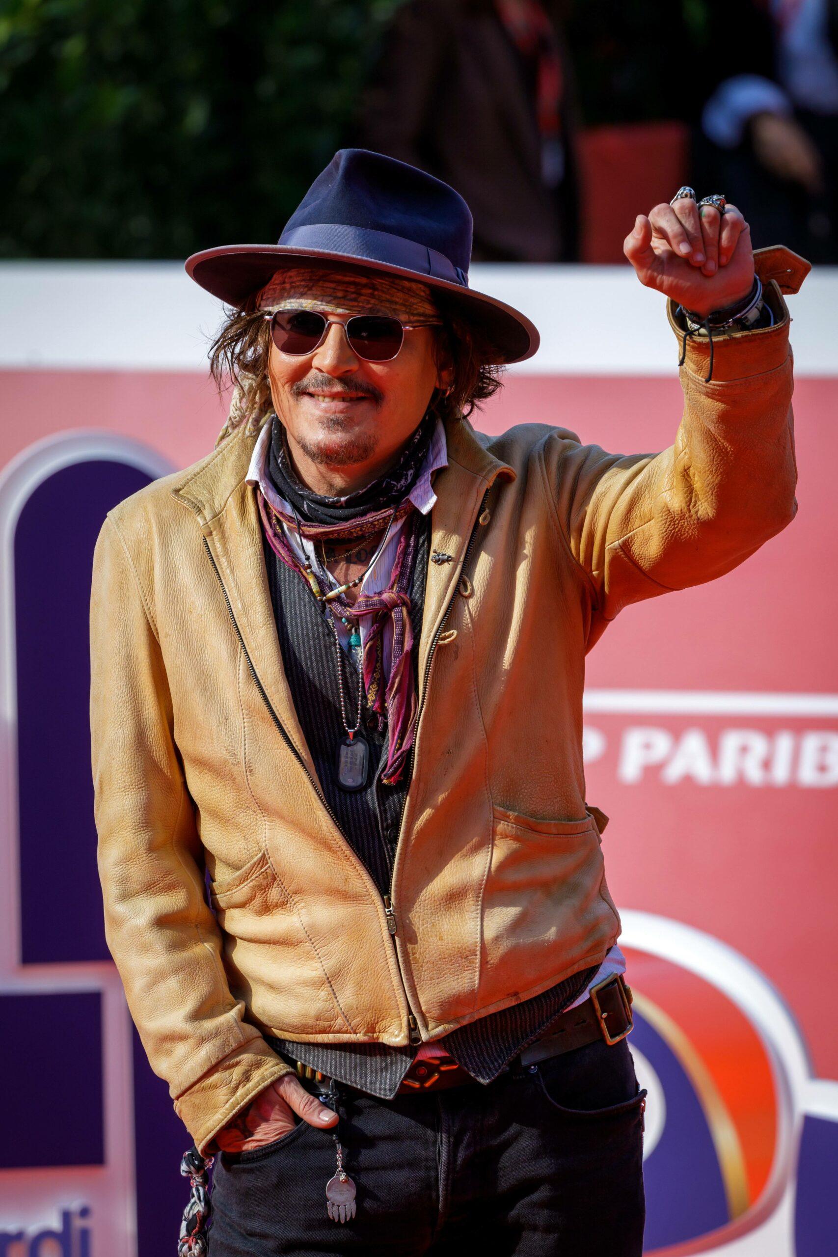 Italy: Johnny Depp walk red carpet at Rome Cinema Fest