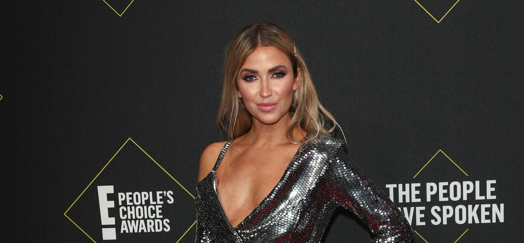 Kaitlyn Bristowe Shows Off Chest And Abs In Neon Cut-Out Bathing Suit
