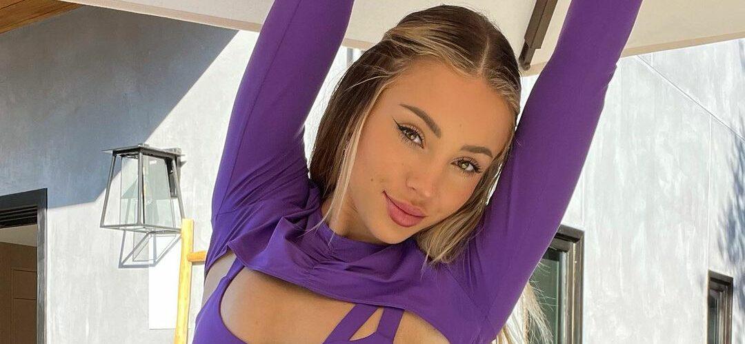 Charly Jordan Works Out In Strappy, Purple Two-Piece