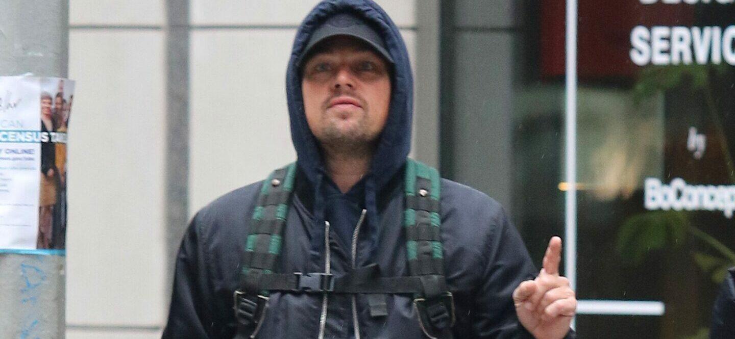 Leonardo DiCaprio helps out a lost tourist with directions in NYC