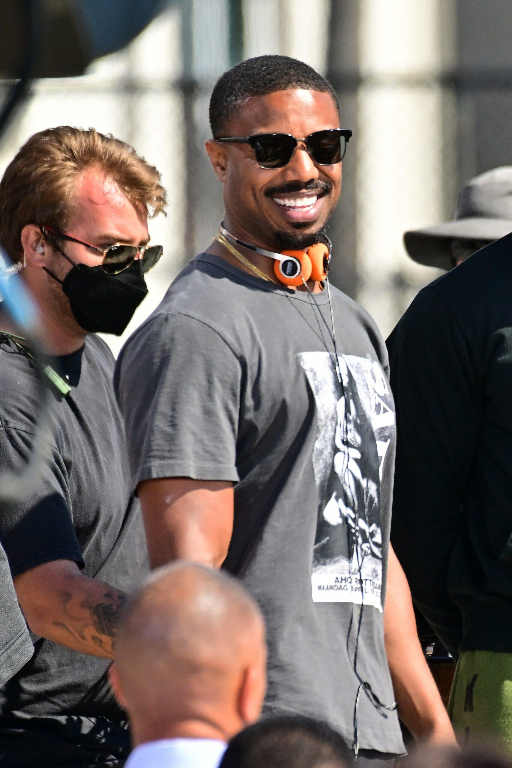 Michael B Jordan is all smiles as he directs quot Creed III quot directing a shirtless Jonathan Majors