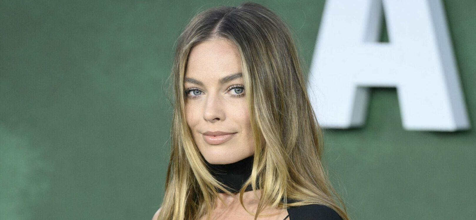 Margot Robbie’s ‘Naked Dress’ Look At Tropfest Labeled ‘A Mess’ As She Flashes Underwear