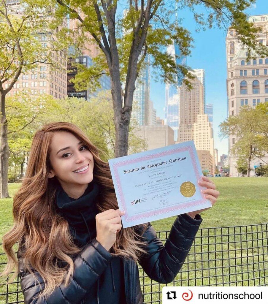 Yanet Garcia showing her nutrition certificate.