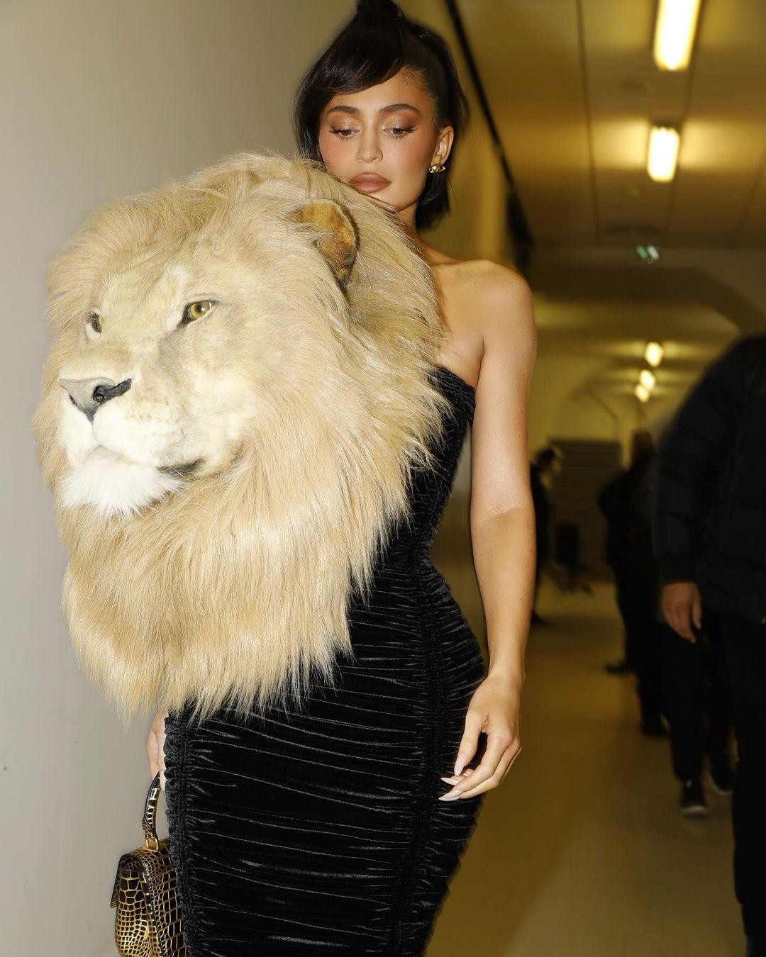 Kylie Jenner wearing lion head dress