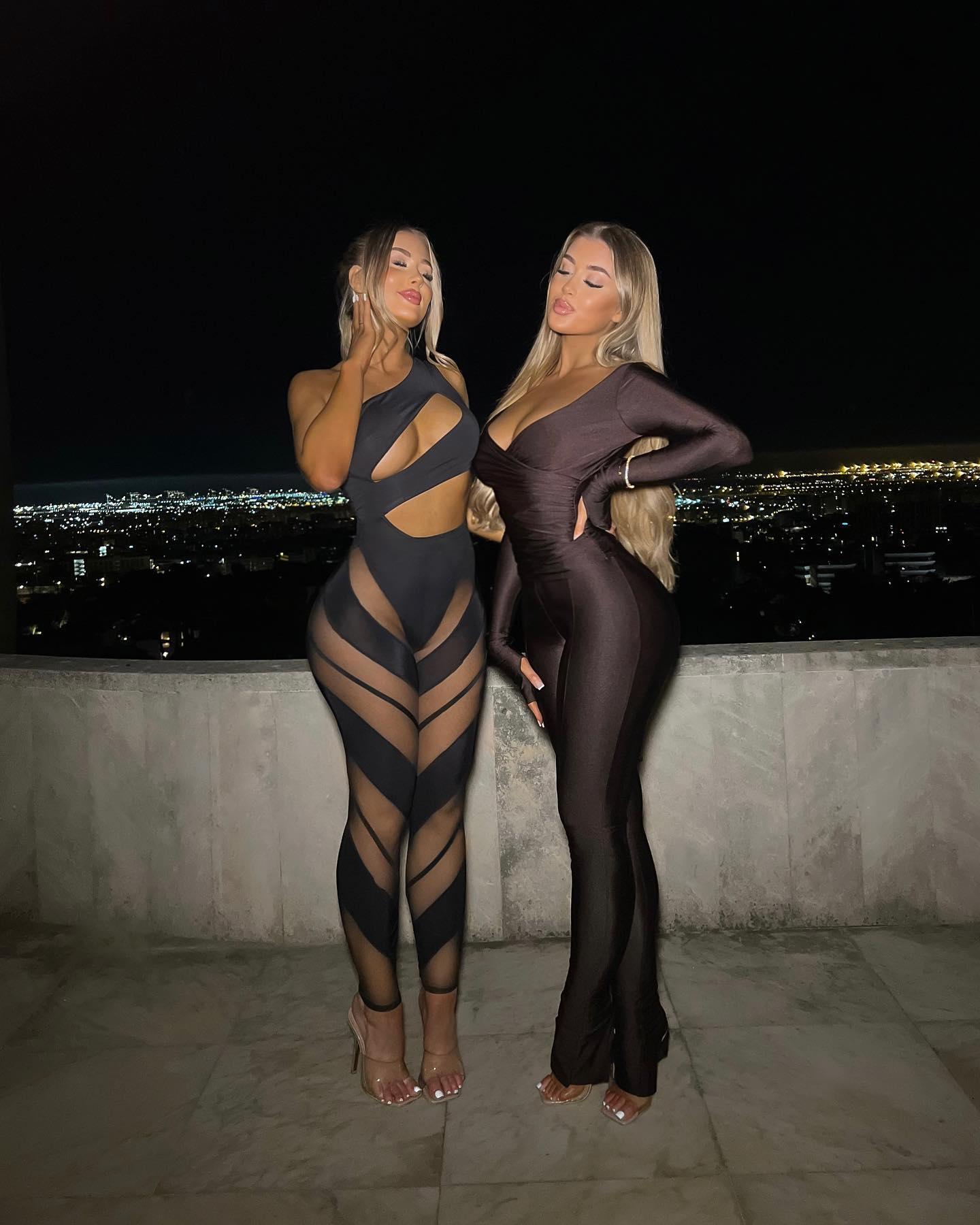 Eve Gale and Jessica Rose Gale pose in sheer bodysuits