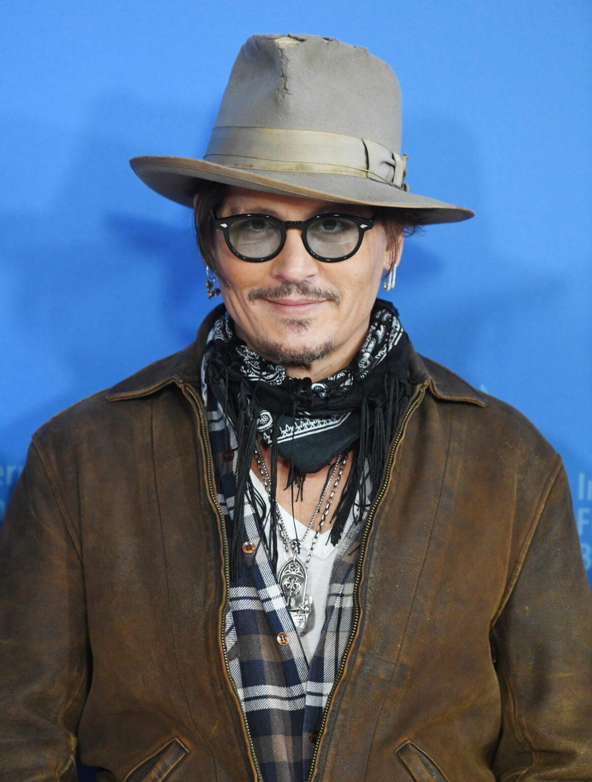 Johnny Depp Delays Tour After Suffering A 'Painful' Ankle Injury