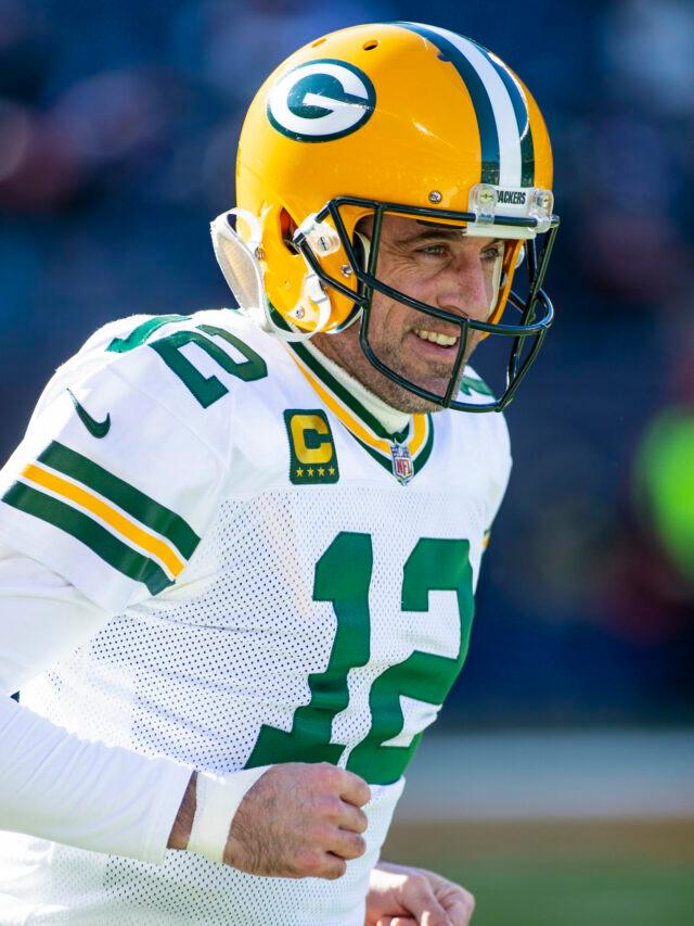 Green Bay Packers quarterback #12 Aaron Rodgers warms up before a game against the Chicago Bears in Chicago