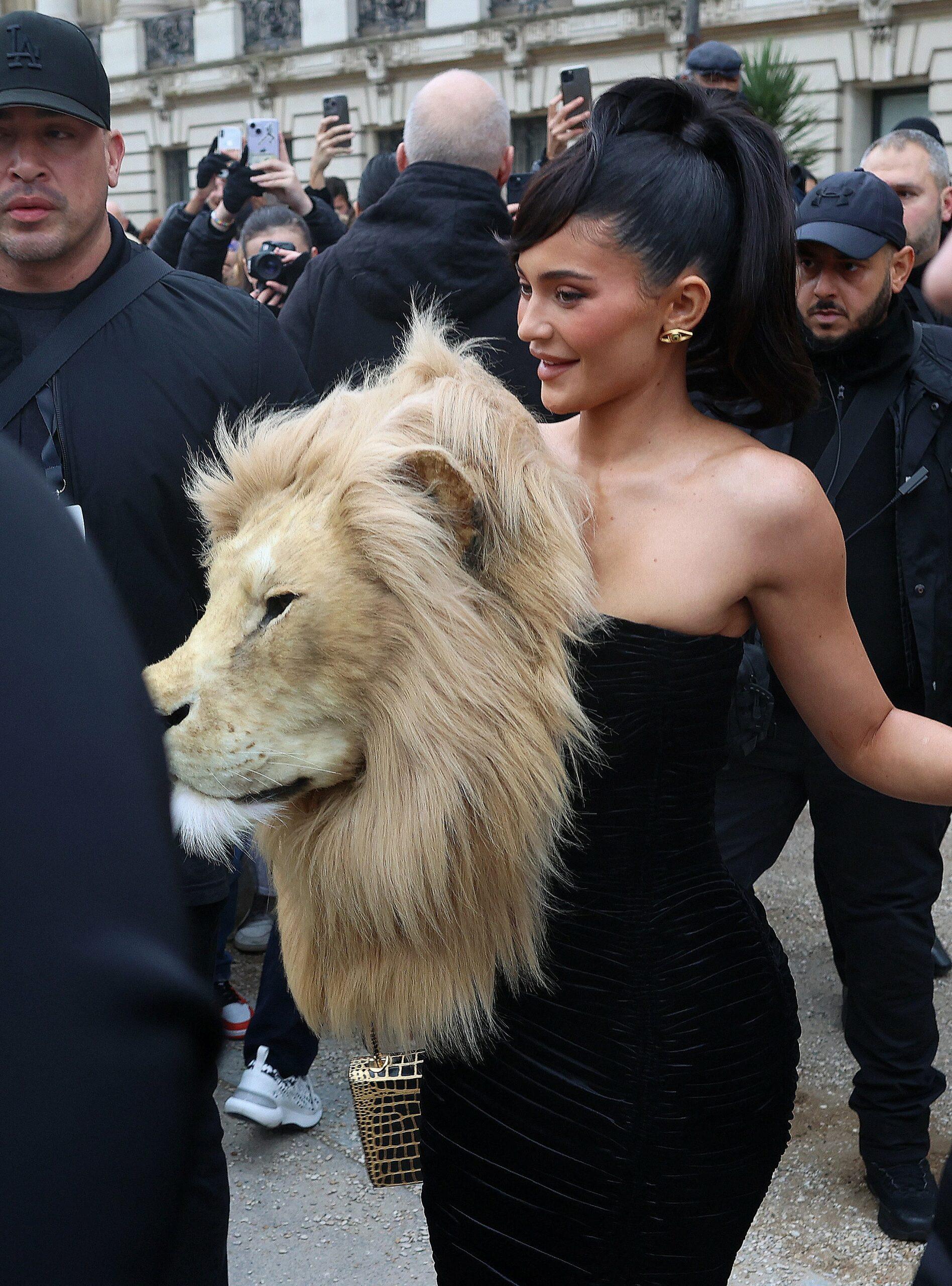 Kylie Jenner Accessorizes With a Giant Faux Lion Head for Paris