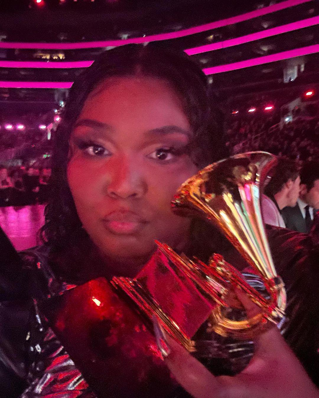 Lizzo dedicates Grammy to Prince and positive music